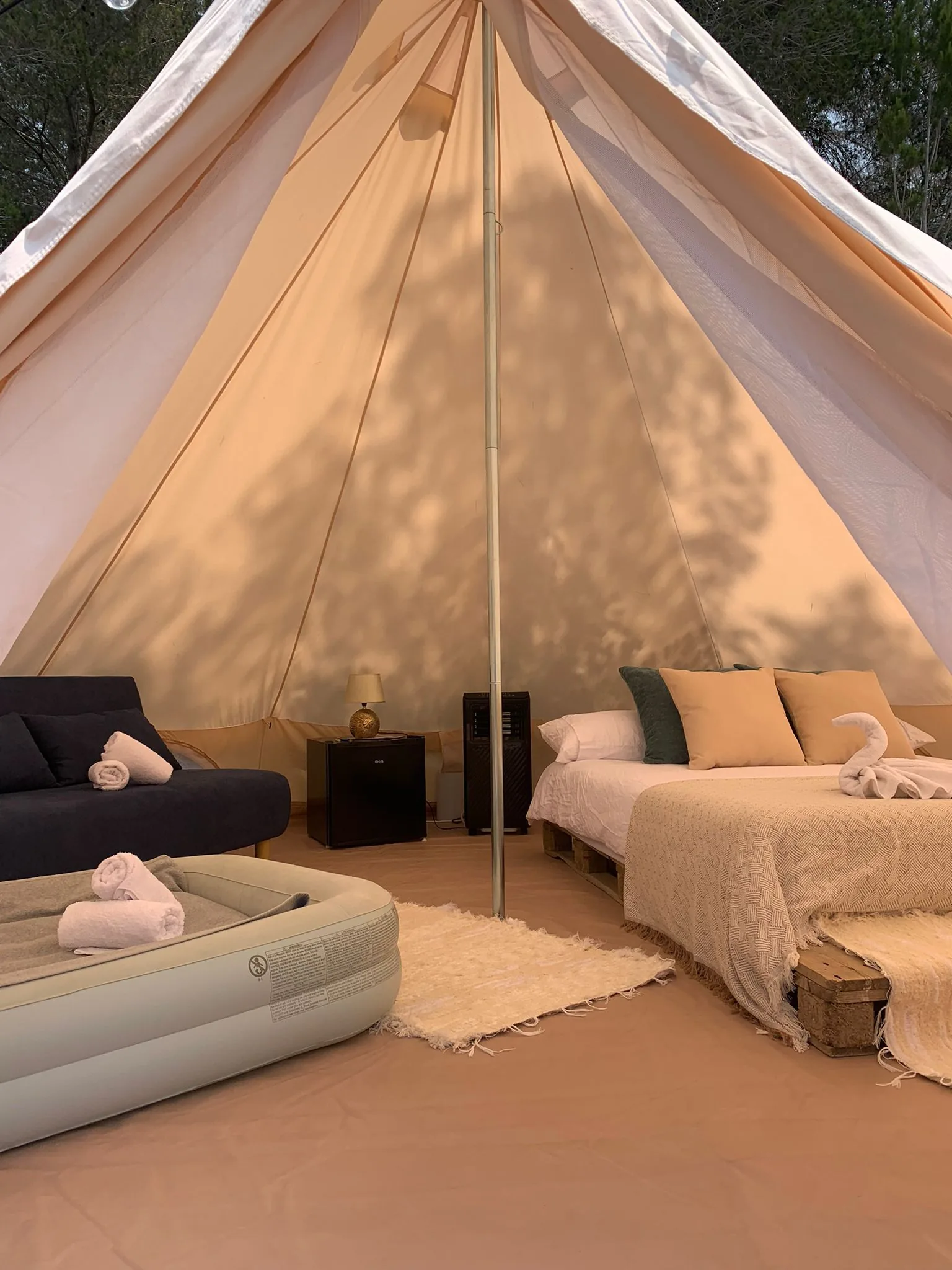 Inside the glamping bell tent — double bed with cozy interior, La Casa de Mis Sueños Ibiza