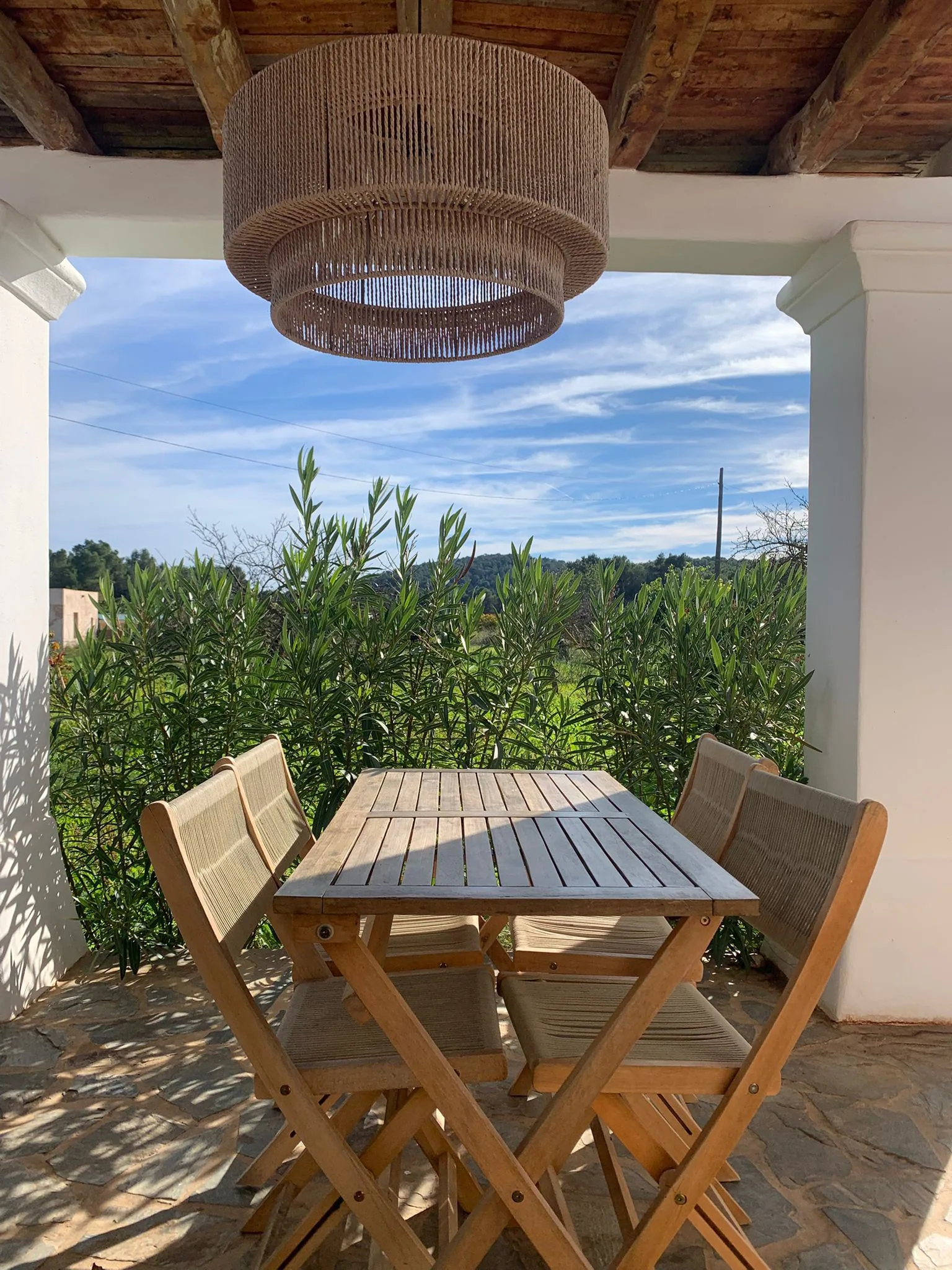 Private finca terrace with olive tree view — outdoor living in Ibiza