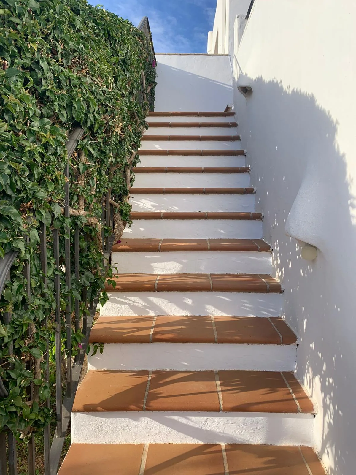 Mediterranean staircase leading up to the rooftop suite — La Casa de Mis Sueños Ibiza
